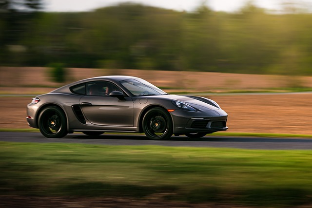 premium automotive service experience luxury sports car and technician in modern workshop